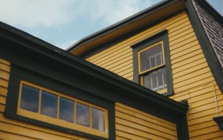 cleaning gutters with pressure washer